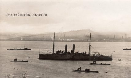 HMS Vulcan and her Flotilla of Submarines
